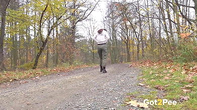 Ali Bordeaux squats and pees on a wooden bench