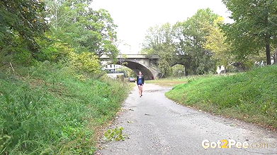 Amanda Hill relieves her piss desperation outside