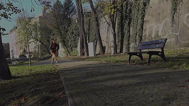 Antonia Sainz rushes to a bench to piss outside