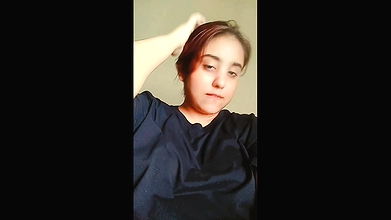 Beautiful girl lifting dress and showing big boobs