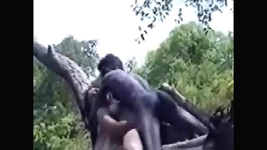 Chubby tribal chick sucks a cock somewhere in the woods