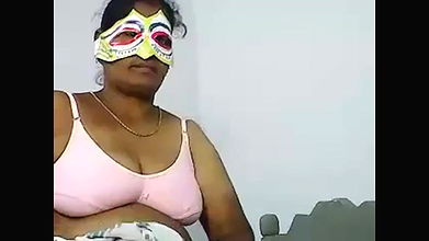 Chubby dark skinned webcam masked Desi whore plays with boobies