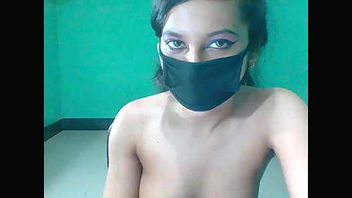 Masked cutie works on webcam and exposes her amateur Indian tits
