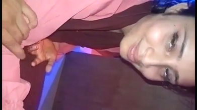 Shy girlfriend sucking dick of lover through pant zip open