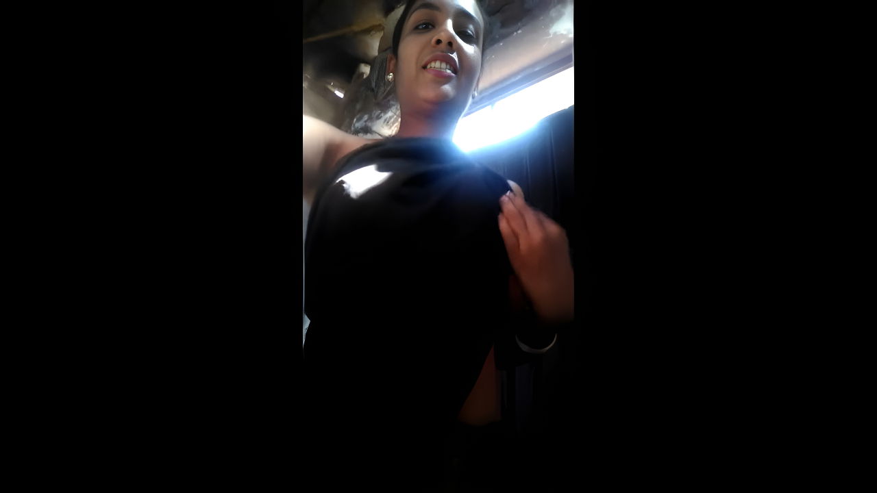 girl pressing own boob