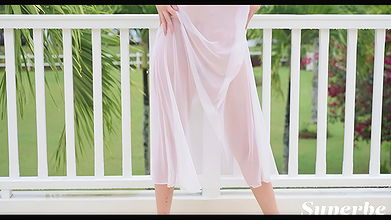 Ravishing brunette looks stunning as she presents her yummy curvy body as she sensually poses outdoors