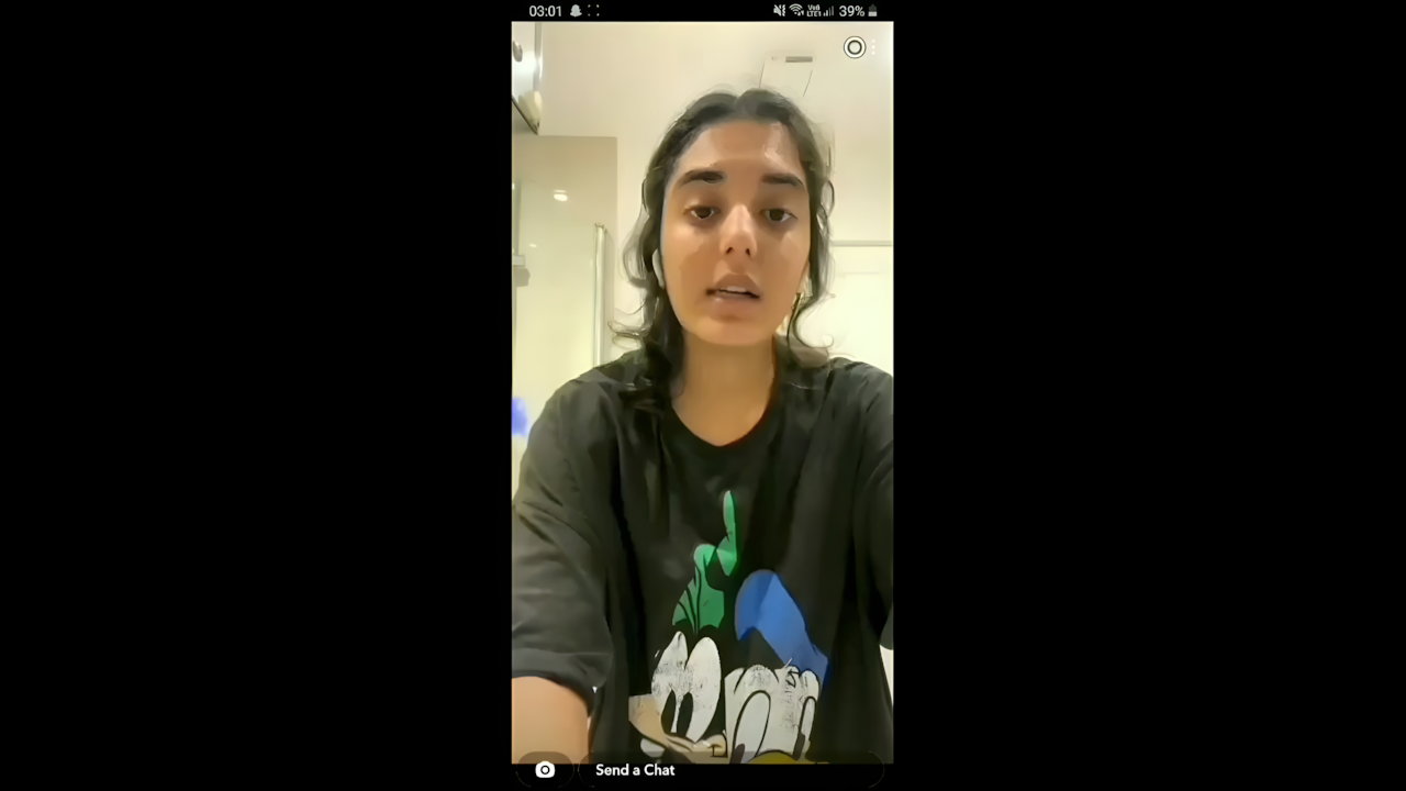 beautiful girlfriend lifting t shirt and showing boobs