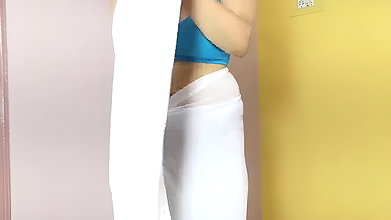 White saree aunty cleavage