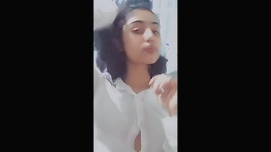 girl opening shirt and round big boobs shown