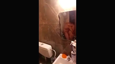 couple fun in bathroom recorded secretly