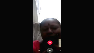 Mature aunty showing her huge boobs in video call