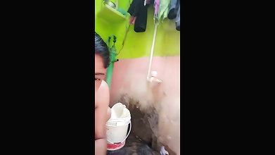 Village aunty taking bath  showing