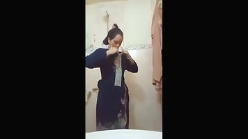 Beautiful Girl Undresses to Show Her Boob in Indian Sex MMS