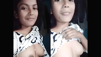 Cute college girl showing her small boobs