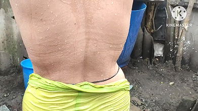 Indian house wife bathing