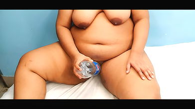 Beautiful Vietnamese woman gets sexually excited and has sex with a Pepsi bottle