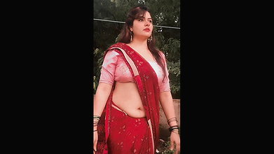 sexy chubby punjabi lady wide tummy and navel in red saree 22