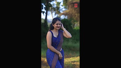cute sexy malayali girl cleavage and navel in violet saree 22