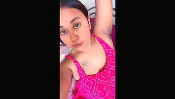 Bengali busty girl playing with her big tits in pink dress