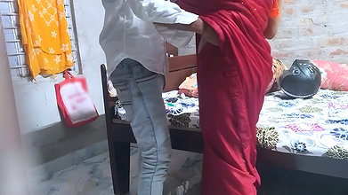 Indian Bhabhi was fucked by her neighbor brother-in-law by lifting her leg when no one was at home