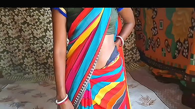 Auntie, clad in a red saree, approaches creating a beautiful and romantic moment filled with love anal sex