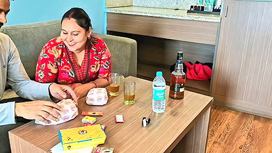 Indian couple intimate in hotel room