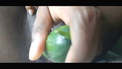 Petty girl playing with Gherkin