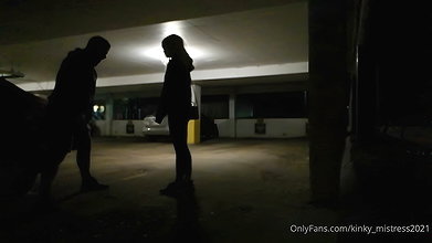 Right in the parking lot a girl punishes a guy in the balls