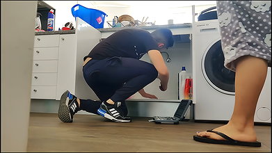 Horny wife fucks handyman under the sink