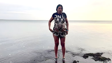Hot pregnant woman enjoys an intense on the beach