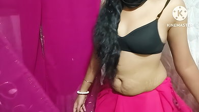 Wabi wearing a red sari