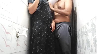Bathroom sex – hot aunty with very young boyfriend