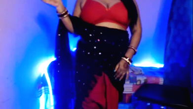 Desi Bhabhi slowly removes her clothes, exposes her sexy boobs and does self sex and does hot pussy fingering