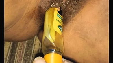 The husband put a bottle in his wife’s pussy or took out water from her pussy