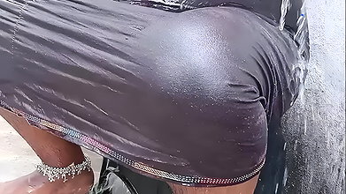 Tamil wife bathing in outdoor