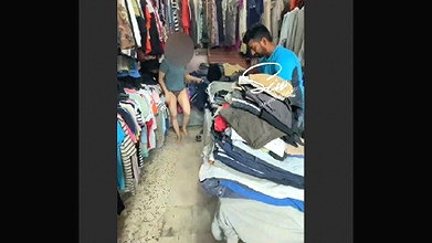 Changing Dress in Front of Shopkeeper