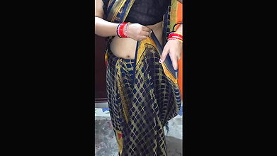 My wife is wearing a sari in her room