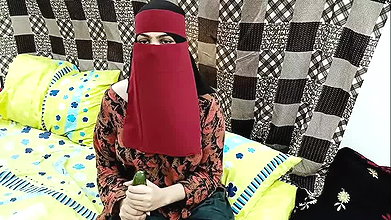 Desi Stepmom in Hijaab Playing With Cucumber