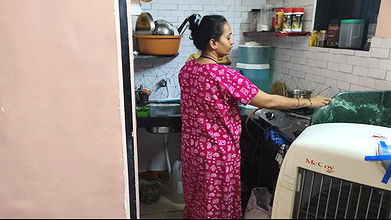 The owner lifted tha saree in tha kitchen to tha maid