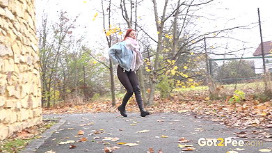 Redhead Babe Relieves Herself In Public Got2pee