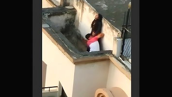 Young lover having on roof,captured