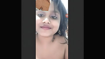 Beautiful girl showing her boobs