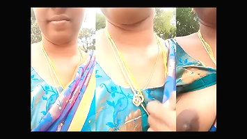 Very beautiful south wife exposing her boobs while going on a bike