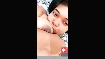 Hot girl sucking her tits 2