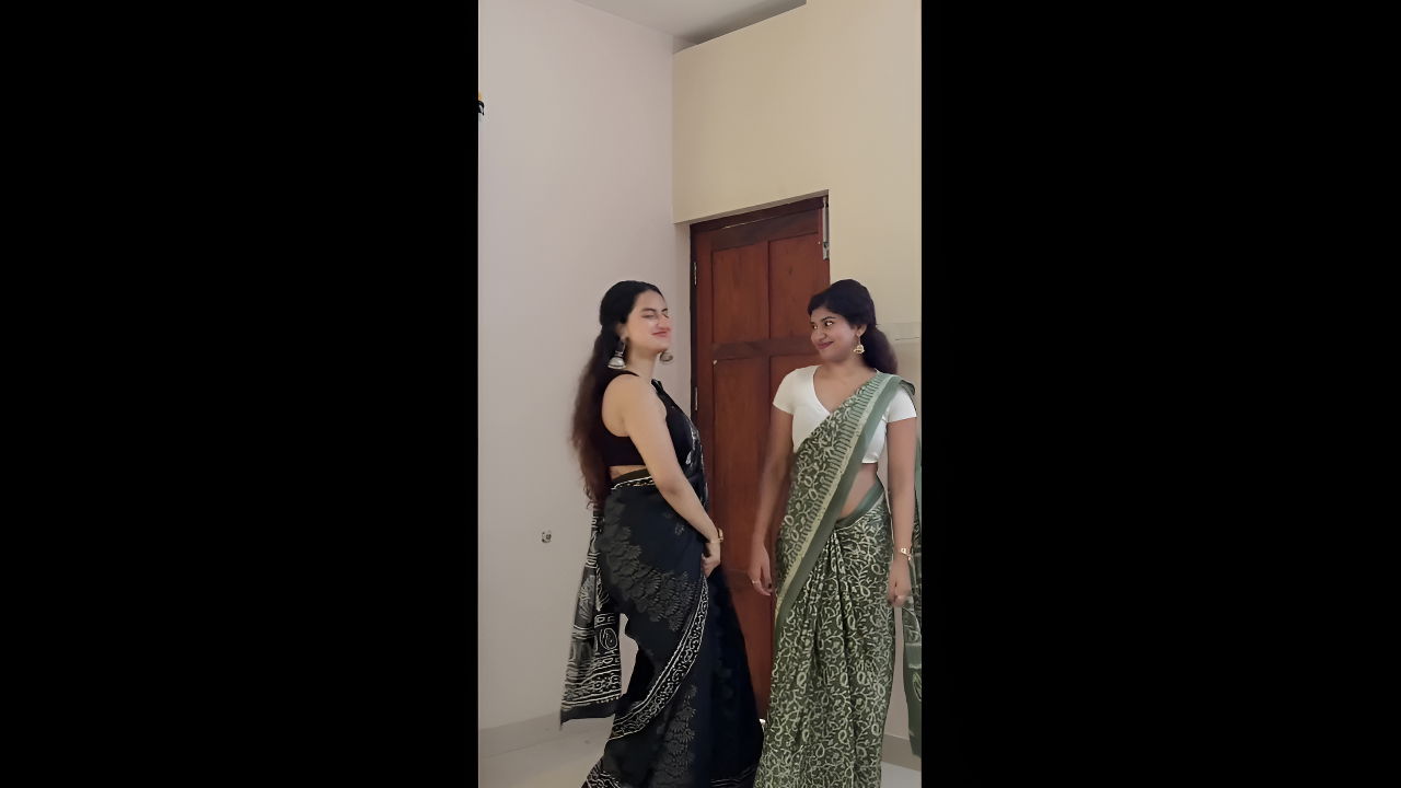 cute malayali girl sexy pierced navel dance in black saree 22