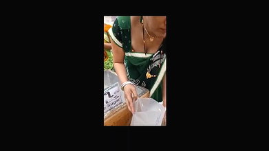 Desi milf awesome cleavage and boobs closeup in supermarket