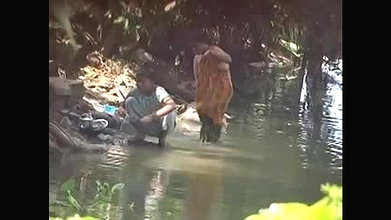 shower in river