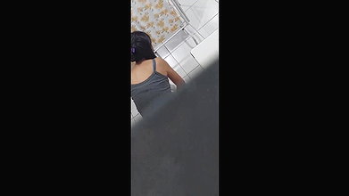 Young babe in thongs caught changing in clinic