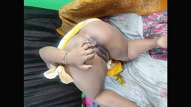 Indian Sruti bhabi fingering her asshole with oils.